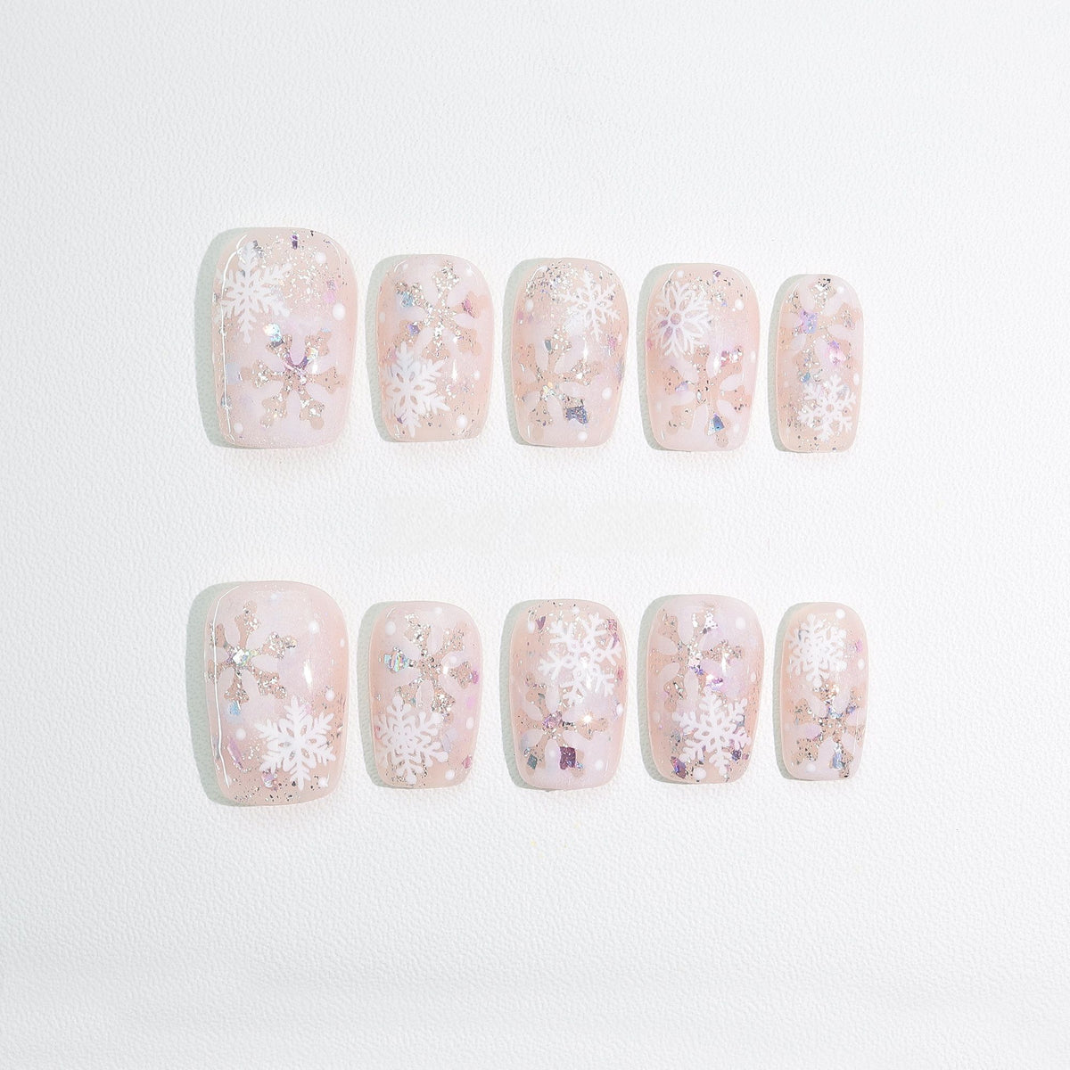 Frosty Pink Snowflake - Handcrafted Sheer Pink & Iridescent Snowflake Press-On Nails