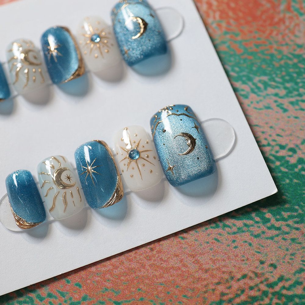 Celestial Blue - Handcrafted Blue Galaxy Cat-Eye & 3D Gold Sun & Moon Press-On Nails